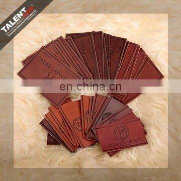 High Quality Customized Private Brand Name Logo Jeans Genuine Leather Patch in Garment photo-6