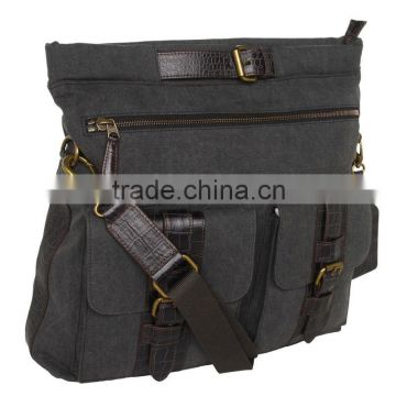 Features an adjustable canvas leather laptop bag with leather trim