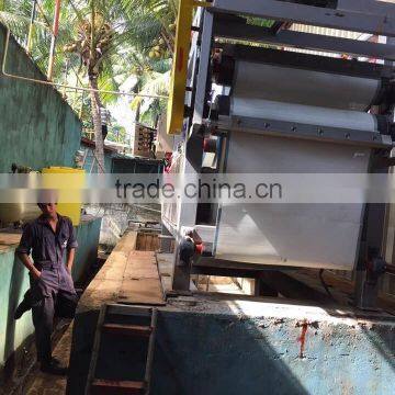 Paper mill waste sludge dehydrator