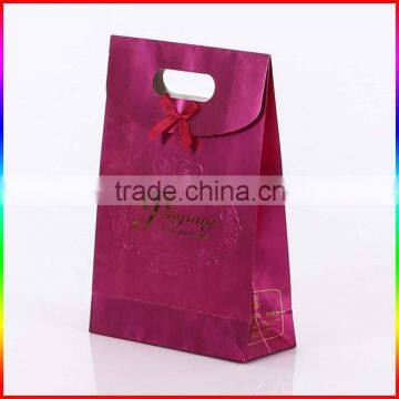 Embossed Magenta Paper Wedding Bag With Gold Printing photo-2