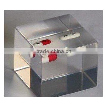 different clear acrylic oil paperweight