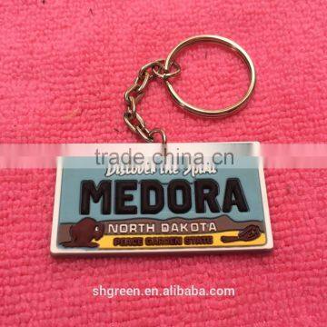 Custom raised logo slicone rubber keychain