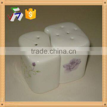 empty ceramic salt & pepper shaker with metal stand