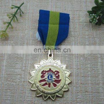 Worldwide regional feature lion baked enamel metal medallion with ribbon