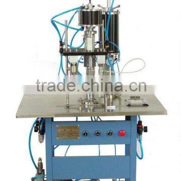 Triad aerosol filling machine