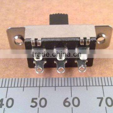 Positive detent slide switch