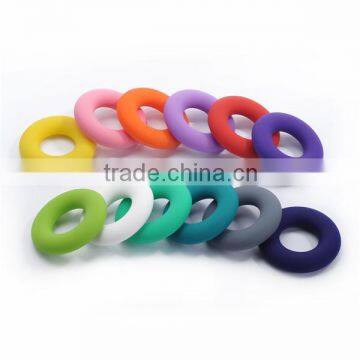 Fashion design donut shaped baby teether bpa free silicone teething pendant for baby chewing