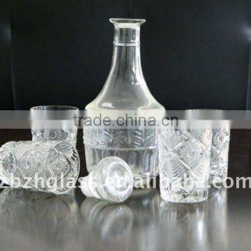 clear round glass wine bottle