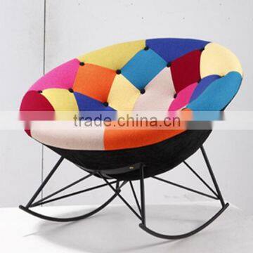 patched fabric round rocking chair