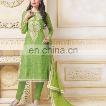 green colored banarasi chanderi suit.