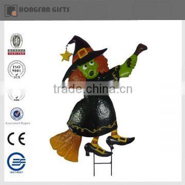 metal halloween witch in garden decoration