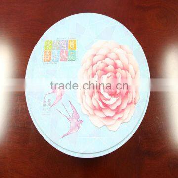 The round tin made in China moon cake box