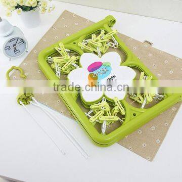 32pegs plastic clothes hanger in China