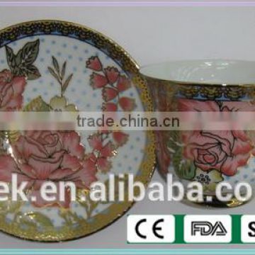 colored cafe tea cup and saucer