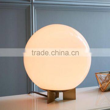 T-001 Round out your nightstand or side table with our white glass simple Globe Table Lamp