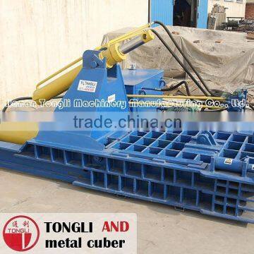 Small baler machine to bale scrap metal