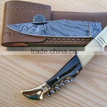 A BUFFALO HORN AND CAMEL BONE CONTRAST HANDLE DAMASCUS STEEL LAGUIOLE KNIFE WITH CORK SCREW