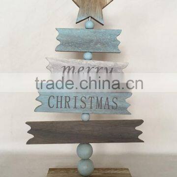 Wooden christmas tree with star decoration xmas gifts for home decorate with words "merry christmas"