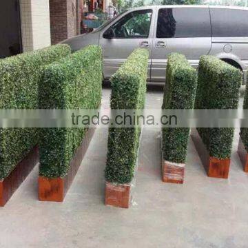 Outdoor plastic boxwood hedge