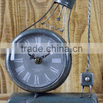 ANTIQUE GREY METAL LIGHT BULB SHAPE TABLE TOP CLOCK