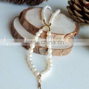 Trendy 4-5mm White Rice Shape Freshwater Pearl Bracelet photo-2
