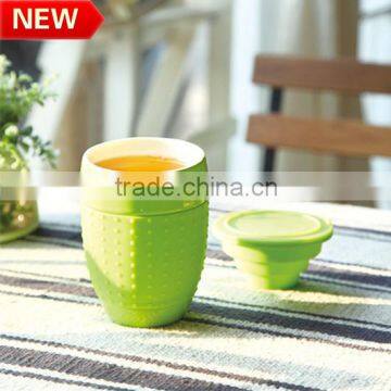 manufacture eco-friendly ceramic water cup with silicone sleeve and tea infuser