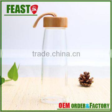 clear round empty glass water bottles sports drinking bottles