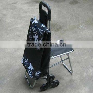 Folding supermarket grocery cart with kids chair.