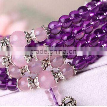 good beautiful real amethyst hand/sweater chain with little silver ornament