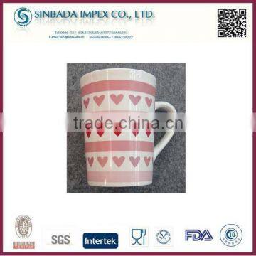 glazed ceramic mug cup with love decal