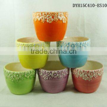 Ceramic flower pot with roses for home and garden decorative