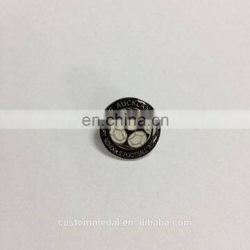 Custom enamel pin or metal pin with butterfly clutch backing with custom logo and glass