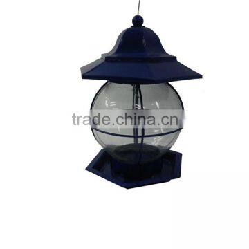 Metal bird feeder with transprent body