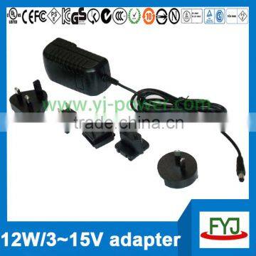 Hot sale multifunctional travel adapter 12v 1a with eu us au uk plug and approved CE RoHS CCC UL FCC GS PSE SAA C-Tick KC