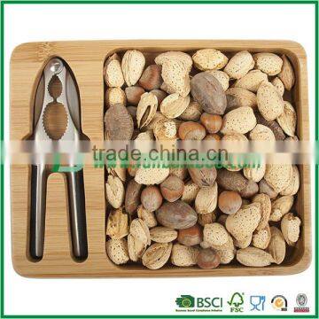 Bamboo nut serving tray with nut cracker