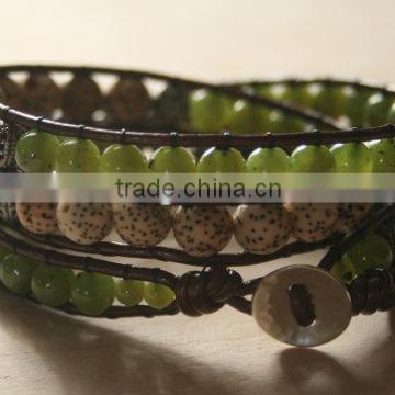 Jade, Sterling Silver, Triple Wrap Leather Beaded Bracelet. Green Jade, Lotus Seed, and Filigree Beads. Sterling Button