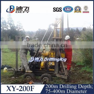 Portable borehole rock core drilling machine