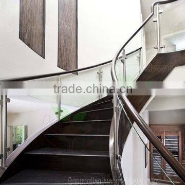 wood step close riser glass rails curved Staircases