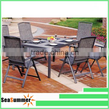 Tempered glass patio dining table chair set--luxury patio dining table set