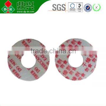 Desiccant adhesive in Fiber material
