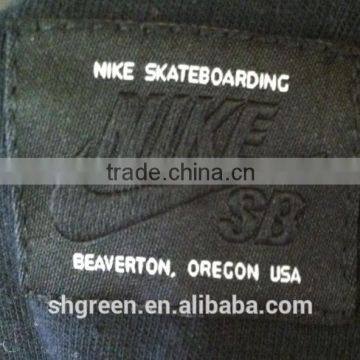 Straight Cut Black Background Black Logo Woven Label