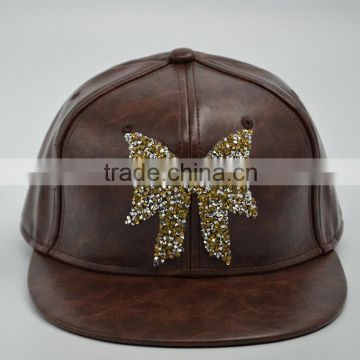 Faux leather snapback cap