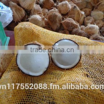 semi husk mature coconut