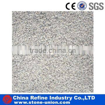 Bush hammered andesite stone