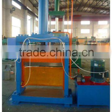 Hydraulic rubber cutter / bale splitter for rubber