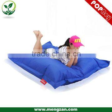 Luxury outdoor swimming pool floating beanbag