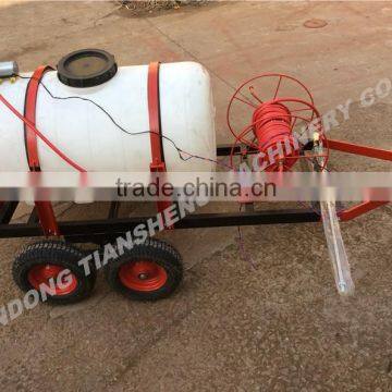 Tractor implement boom sprayer