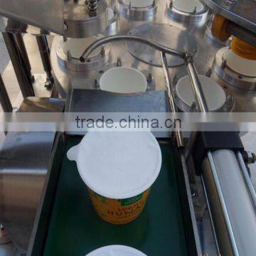 Yogurt cup filling and sealing machine with aluminum foil lid
