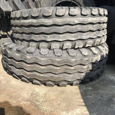 Striated guide tire combine harvester tire