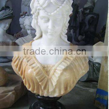 polished carved stone bust